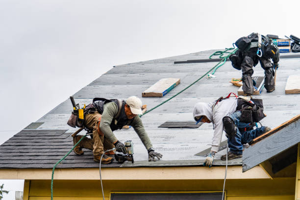 Professional Roofing technician working in Burton, TX